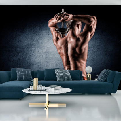 Fototapeta Umięśniony Mężczyzna Z Hantlem