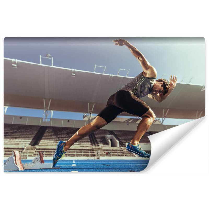 Fototapeta Sprinter Wybiegający Z Bloku Startowego