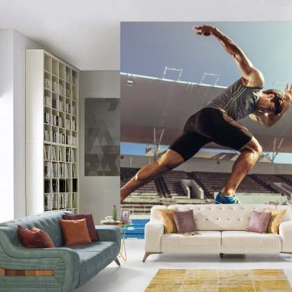 Fototapeta Sprinter Wybiegający Z Bloku Startowego