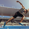 Fototapeta Sprinter Wybiegający Z Bloku Startowego