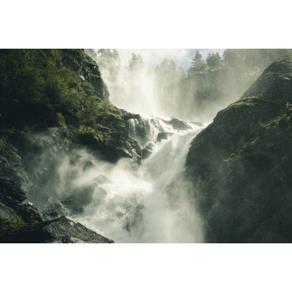 Fototapeta A Flowing Waterfall In Norway