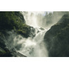 Fototapeta A Flowing Waterfall In Norway