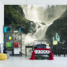 Fototapeta A Flowing Waterfall In Norway